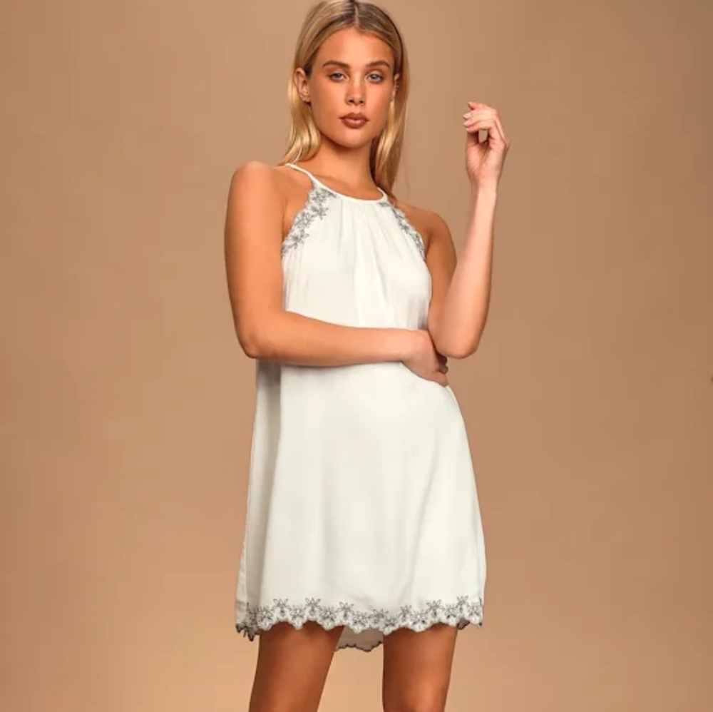Elegant White Sleeveless Dress with Gray Embroidery